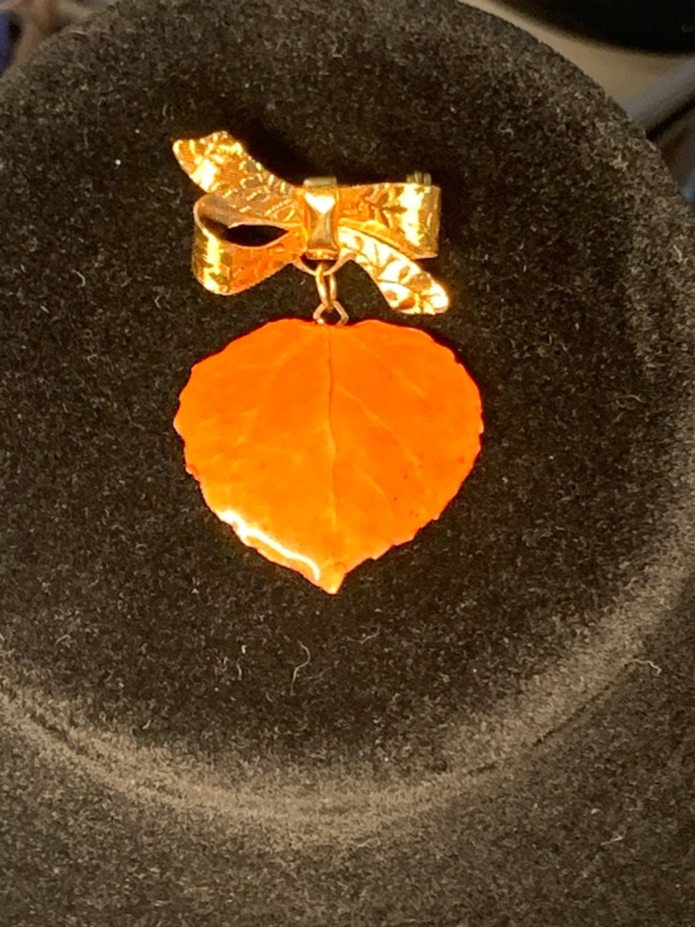 Gold Bow Brooch with Orange Leaf Pendant
